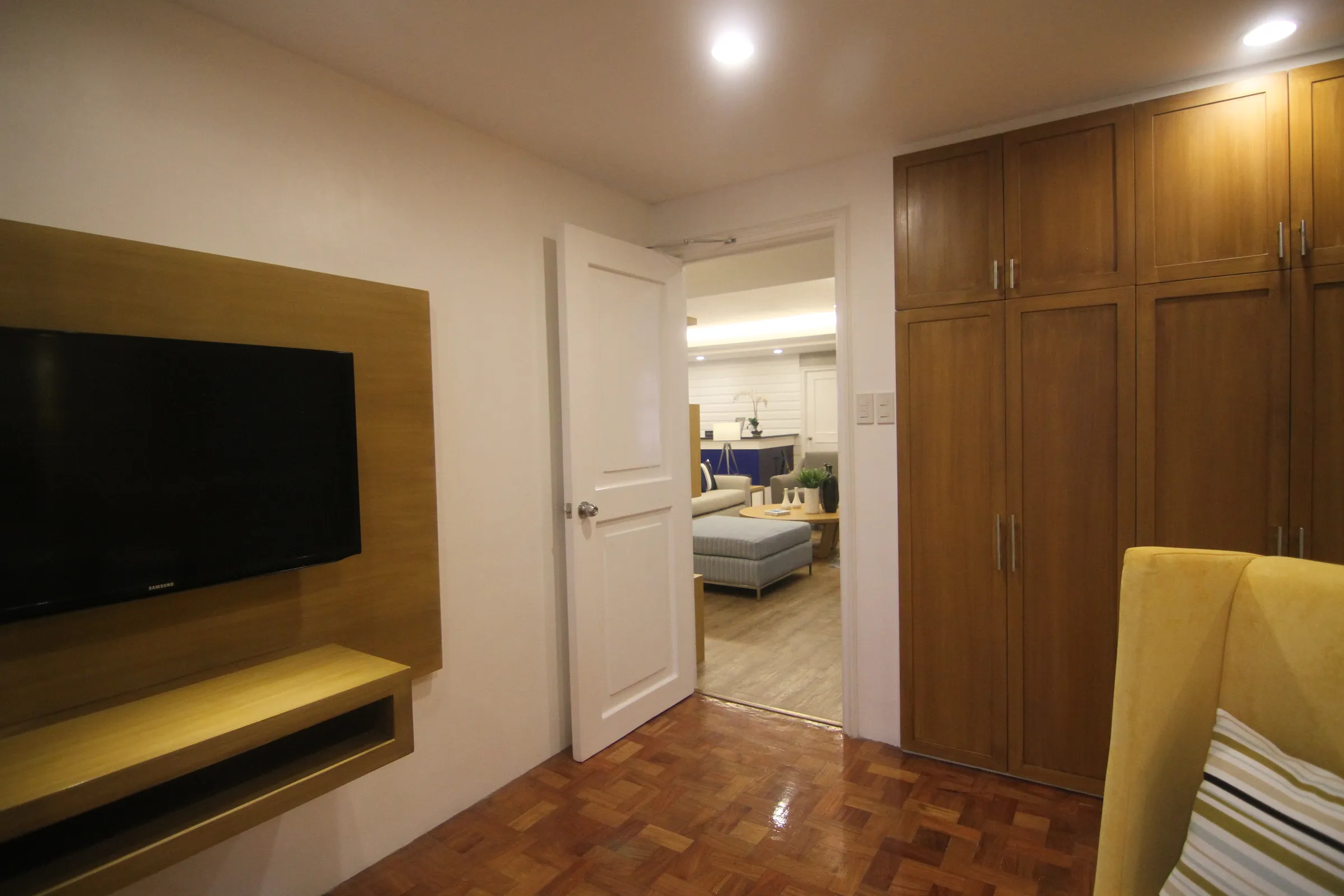 The Deluxe Triple's adjoining living area, seen through the doorway.